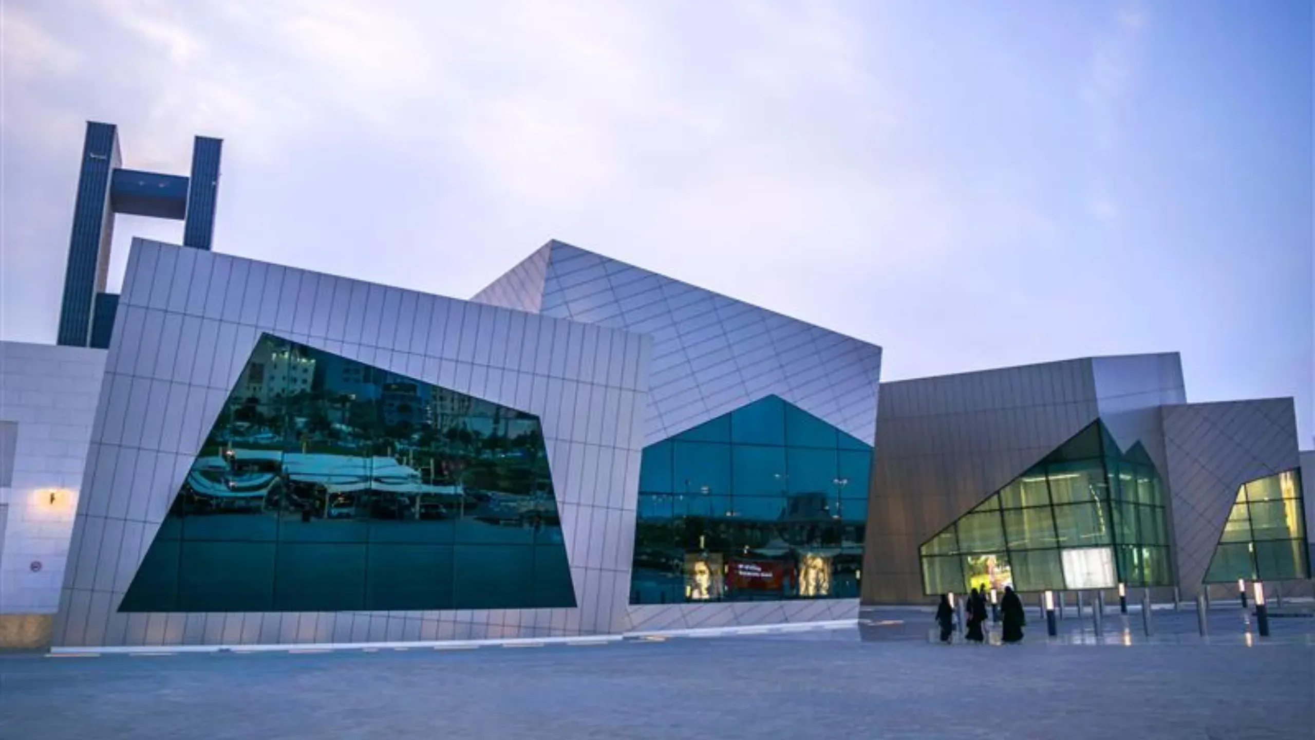 The Avenues Mall waterfront exterior at Bahrain Bay, Manama, featuring modern luxury architecture and unique facade. 